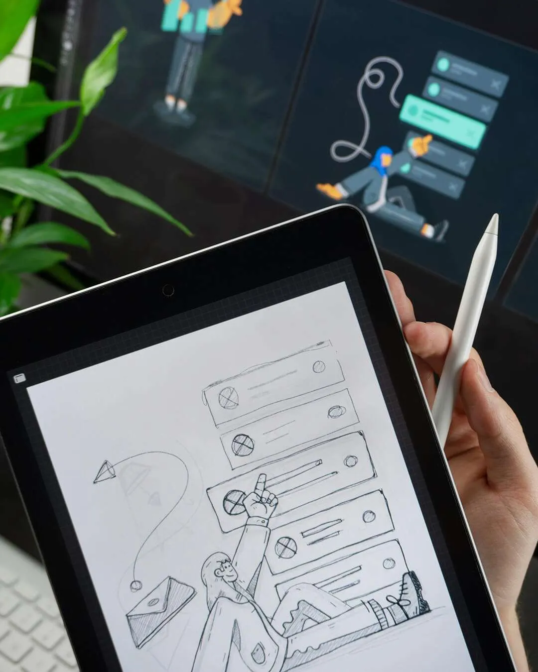 Designer looks at wireframe features on tablet